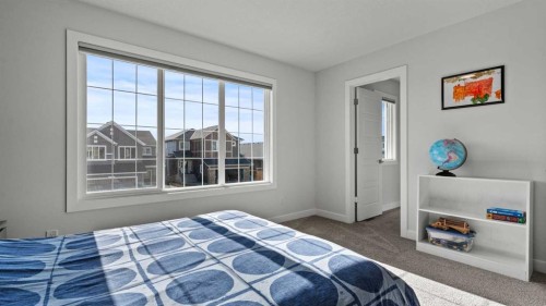 152 Threepoint Cove, Okotoks, AB - Indoor Photo Showing Bedroom