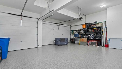 152 Threepoint Cove, Okotoks, AB - Indoor Photo Showing Garage