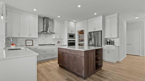 152 Threepoint Cove, Okotoks, AB - Indoor Photo Showing Kitchen With Upgraded Kitchen