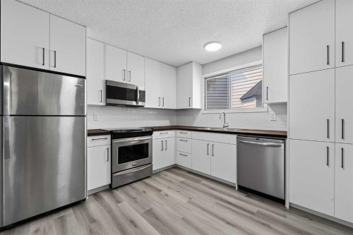 723 55 Avenue Sw, Calgary, AB - Indoor Photo Showing Kitchen