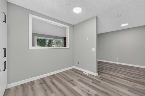 723 55 Avenue Sw, Calgary, AB - Indoor Photo Showing Other Room