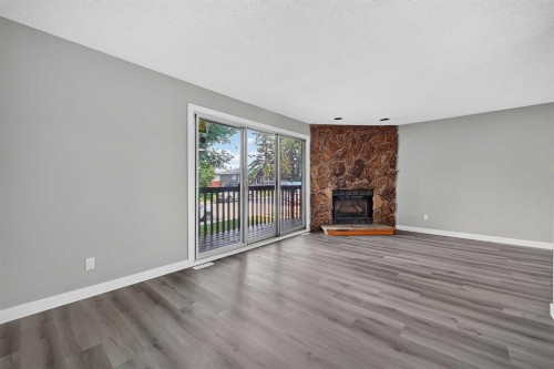 723 55 Avenue Sw, Calgary, AB - Indoor With Fireplace