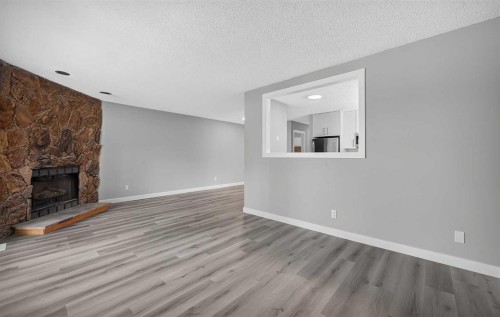 723 55 Avenue Sw, Calgary, AB - Indoor With Fireplace