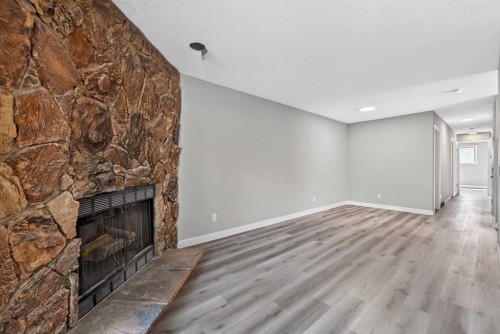 723 55 Avenue Sw, Calgary, AB - Indoor With Fireplace