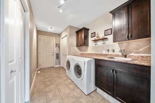259 Willow Ridge Manor, Diamond Valley, AB - Indoor Photo Showing Laundry Room