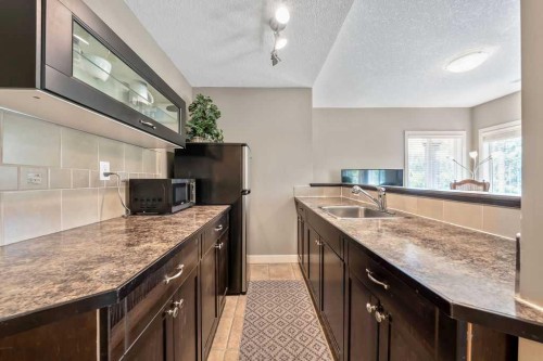 259 Willow Ridge Manor, Diamond Valley, AB - Indoor Photo Showing Kitchen
