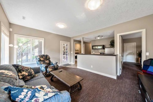 259 Willow Ridge Manor, Diamond Valley, AB - Indoor Photo Showing Living Room