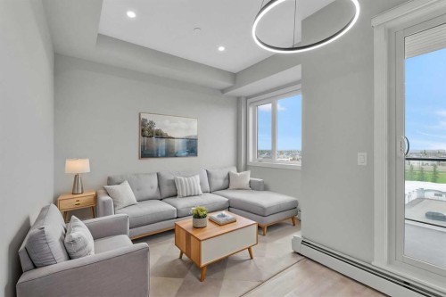 516-8230 Broadcast Avenue Sw, Calgary, AB - Indoor Photo Showing Living Room