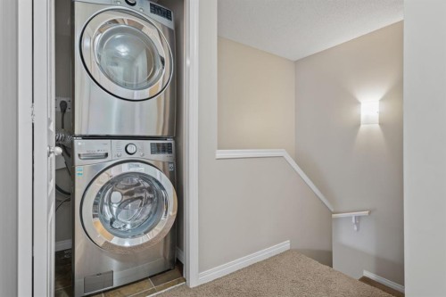 205 New Brighton Villas Se, Calgary, AB - Indoor Photo Showing Laundry Room
