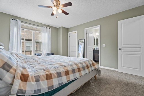 205 New Brighton Villas Se, Calgary, AB - Indoor Photo Showing Bedroom