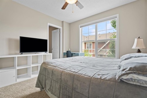 205 New Brighton Villas Se, Calgary, AB - Indoor Photo Showing Bedroom