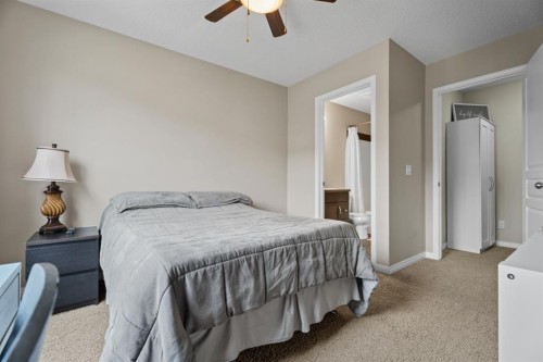 205 New Brighton Villas Se, Calgary, AB - Indoor Photo Showing Bedroom
