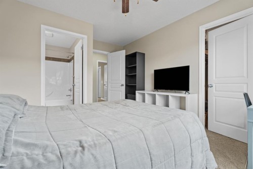 205 New Brighton Villas Se, Calgary, AB - Indoor Photo Showing Bedroom