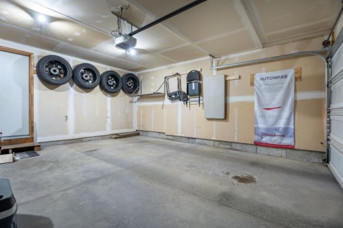 205 New Brighton Villas Se, Calgary, AB - Indoor Photo Showing Garage