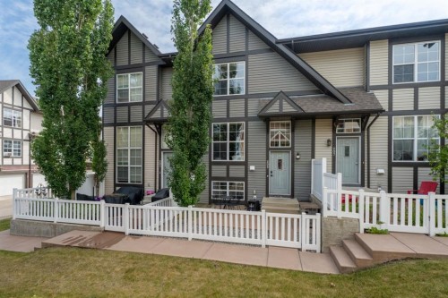 205 New Brighton Villas Se, Calgary, AB - Outdoor With Facade