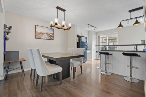 205 New Brighton Villas Se, Calgary, AB - Indoor Photo Showing Dining Room