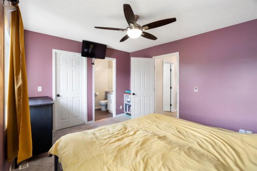 7865 24 Street Se, Calgary, AB - Indoor Photo Showing Bedroom
