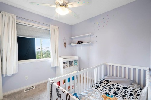 7865 24 Street Se, Calgary, AB - Indoor Photo Showing Bedroom