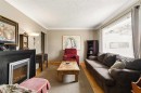 440 36 Avenue Nw, Calgary, AB  - Indoor Photo Showing Living Room With Fireplace 