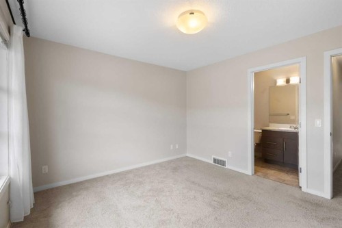 506 Evansridge Park Nw, Calgary, AB - Indoor Photo Showing Other Room