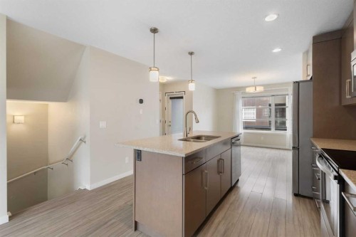 506 Evansridge Park Nw, Calgary, AB - Indoor Photo Showing Kitchen With Double Sink With Upgraded Kitchen