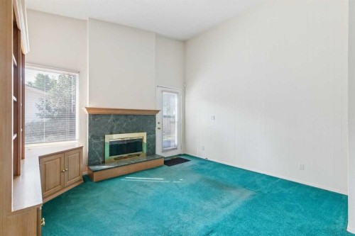 567 Parkridge Drive Se, Calgary, AB - Indoor With Fireplace