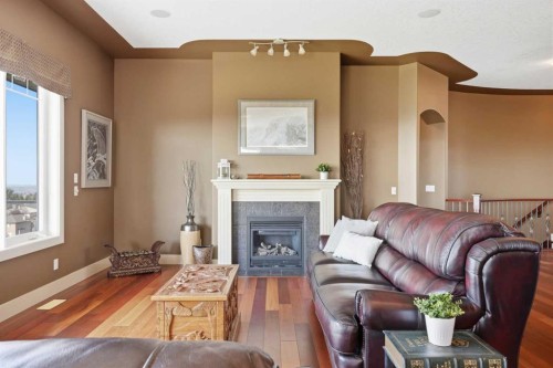 87 Royal Ridge Terrace Nw, Calgary, AB - Indoor Photo Showing Living Room With Fireplace