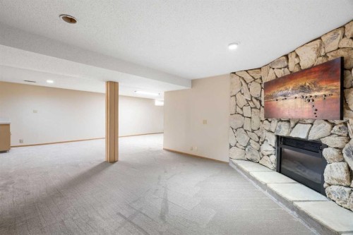 3032 32A Avenue Se, Calgary, AB - Indoor With Fireplace