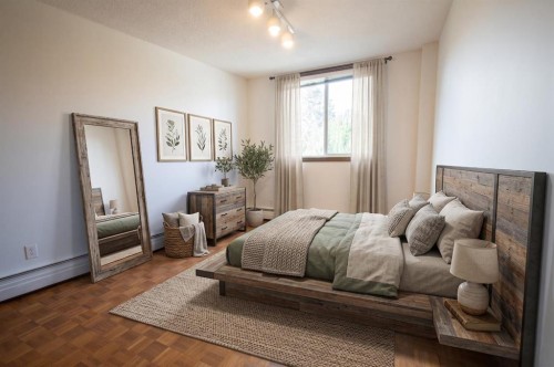 201-512 Cedar Crescent Sw, Calgary, AB - Indoor Photo Showing Bedroom