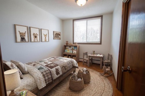 201-512 Cedar Crescent Sw, Calgary, AB - Indoor Photo Showing Bedroom