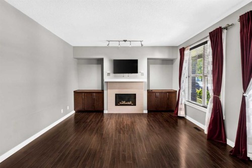 235 Mckenzie Towne Link Se, Calgary, AB - Indoor With Fireplace