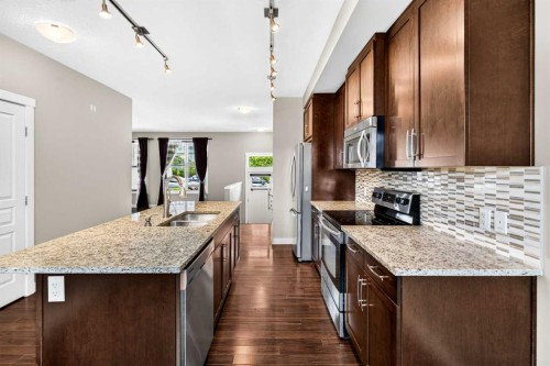 235 Mckenzie Towne Link Se, Calgary, AB - Indoor Photo Showing Kitchen With Double Sink With Upgraded Kitchen