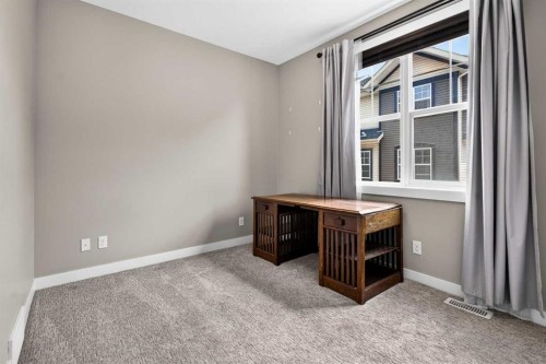 235 Mckenzie Towne Link Se, Calgary, AB - Indoor Photo Showing Other Room