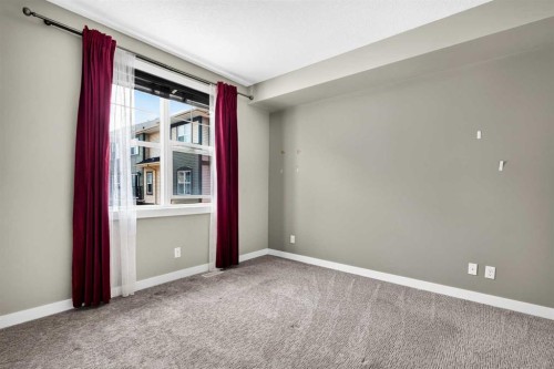235 Mckenzie Towne Link Se, Calgary, AB - Indoor Photo Showing Other Room