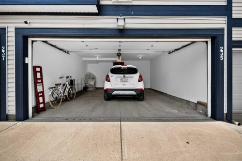 235 Mckenzie Towne Link Se, Calgary, AB - Indoor Photo Showing Garage