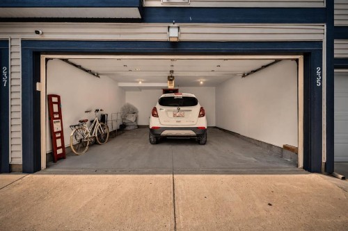 235 Mckenzie Towne Link Se, Calgary, AB - Indoor Photo Showing Garage