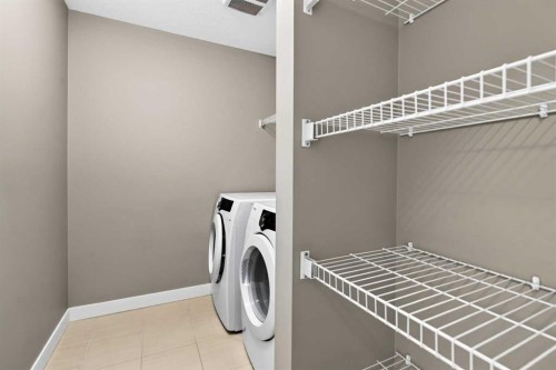 235 Mckenzie Towne Link Se, Calgary, AB - Indoor Photo Showing Laundry Room