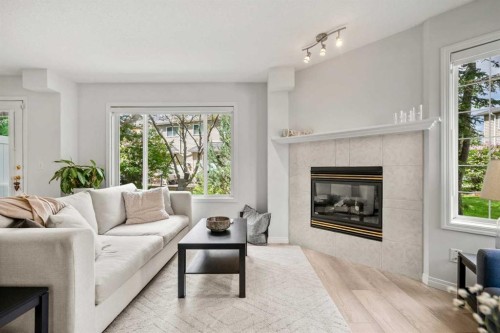 40 Chaparral Ridge Terrace Se, Calgary, AB - Indoor Photo Showing Living Room With Fireplace