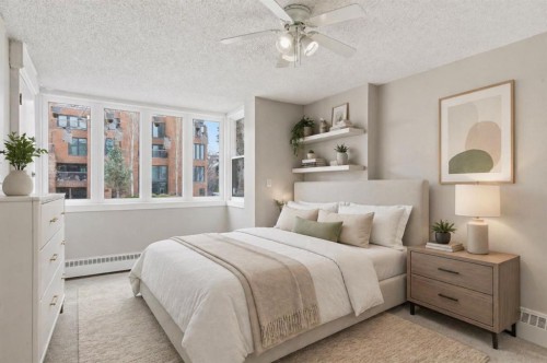 105-345 4 Avenue Ne, Calgary, AB - Indoor Photo Showing Bedroom