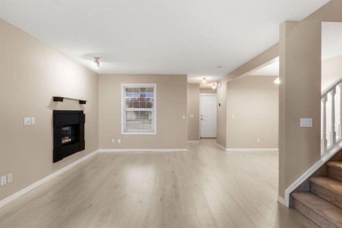 147-7707 Martha'S Haven Park Ne, Calgary, AB - Indoor With Fireplace