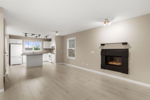 147-7707 Martha'S Haven Park Ne, Calgary, AB - Indoor With Fireplace