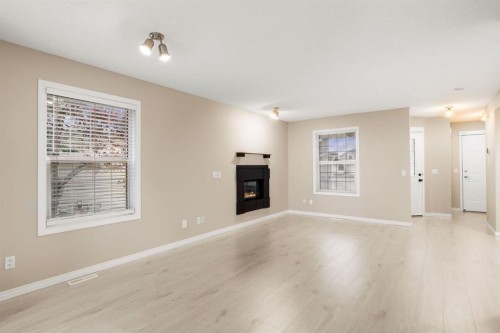 147-7707 Martha'S Haven Park Ne, Calgary, AB - Indoor With Fireplace