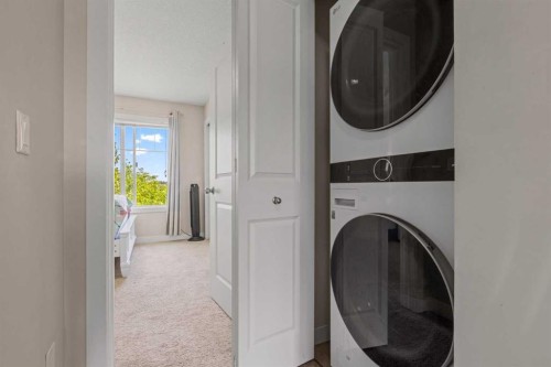 64-300 Marina Drive, Chestermere, AB - Indoor Photo Showing Laundry Room