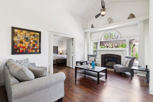 70 Discovery Ridge Court Sw, Calgary, AB - Indoor Photo Showing Living Room With Fireplace