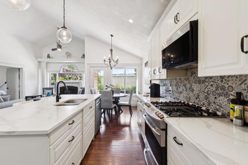 70 Discovery Ridge Court Sw, Calgary, AB - Indoor Photo Showing Kitchen With Double Sink With Upgraded Kitchen