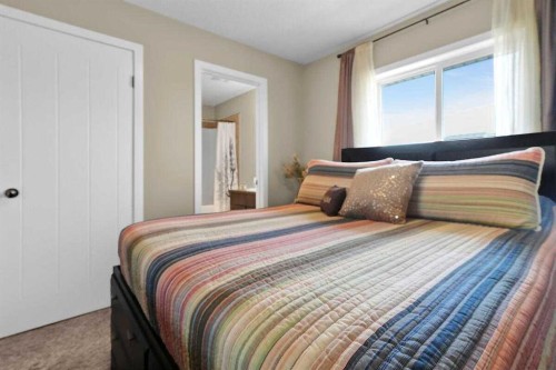 460 Seclusion Valley Drive, Diamond Valley, AB - Indoor Photo Showing Bedroom
