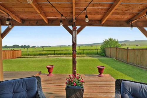 460 Seclusion Valley Drive, Diamond Valley, AB - Outdoor With Deck Patio Veranda
