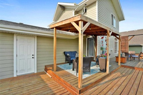 460 Seclusion Valley Drive, Diamond Valley, AB - Outdoor With Deck Patio Veranda With Exterior