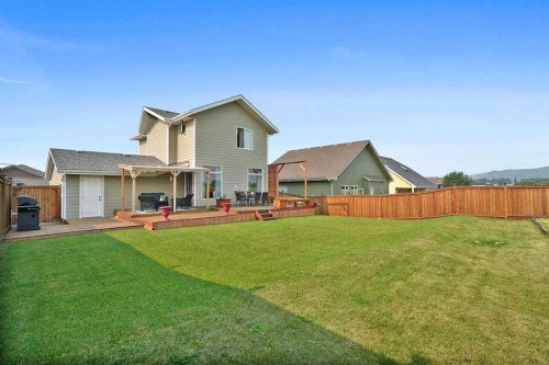 460 Seclusion Valley Drive, Diamond Valley, AB - Outdoor With Deck Patio Veranda