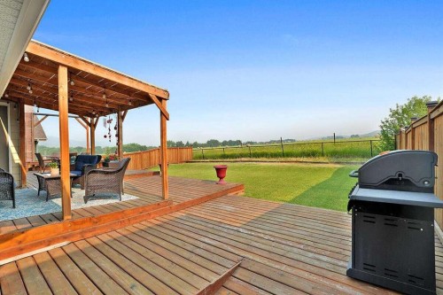 460 Seclusion Valley Drive, Diamond Valley, AB - Outdoor With Deck Patio Veranda